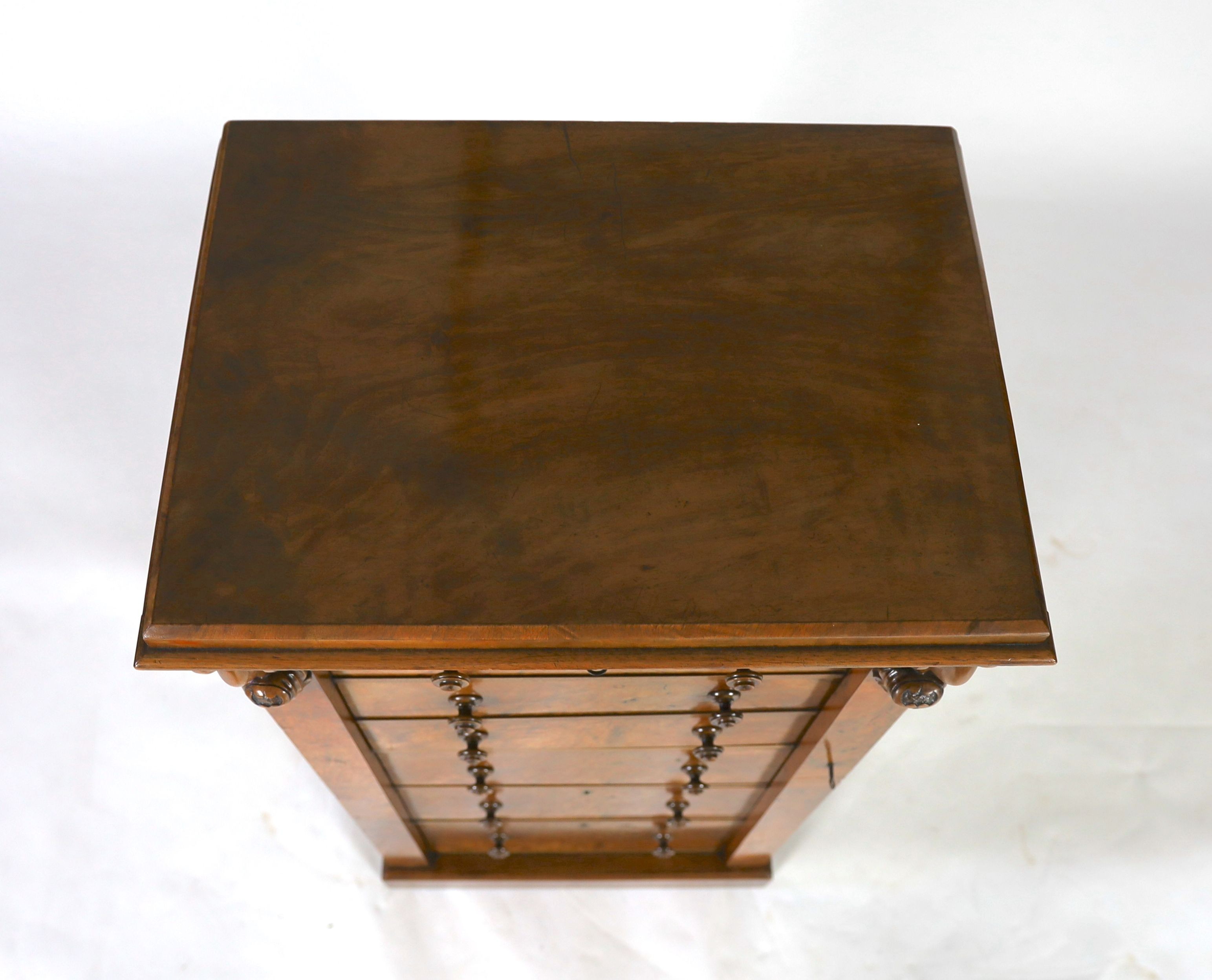 A Victorian figured walnut secretaire Wellington chest, W.59cm D.43cm H.124cm